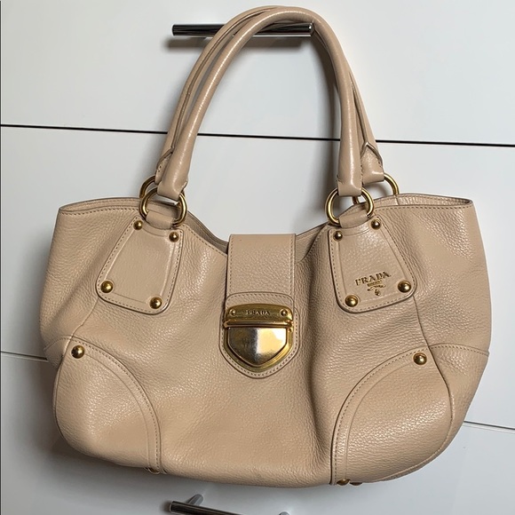 Prada Handbags - Authentic Prada Ivory Pushlock Tote Vitello Daino Medium Buckle bag